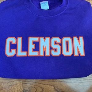 Clemson Stitched Sweatshirt with paw on arm